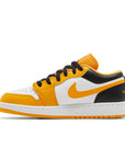 Side of the grade school Nike Air Jordan 1 Low Taxi children shoes in black, yellow and white