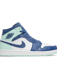 Side of the Nike Air Jordan 1 Mid Mystic Navy sneakers in blue and mint