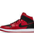 Side of Nike Air Jordan 1 Mid Reverse Bred baskteball shoes in black and red