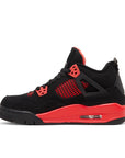 Side of the grade school kids Nike Air Jordan 4 red thunder basketball shoes in black and red