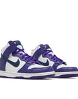A pair of the Older Kids / Grade School Nike dunk high basketball shoes in electro purple midnight navy