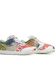 A pair of the Nike dunk low city market in a multi colour