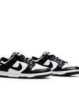 A pair of the Nike dunk low in a black white "Panda" colour
