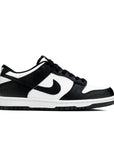 Side of the youth version of the Nike dunk low in a black white "Panda" colour
