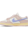 Side of the womens Nike dunk low in a pink lilac "pink oxford" colour