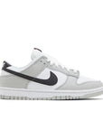 Side of the Nike Dunk Low SE Lottery Pack sneakers in grey