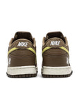 Heel of the Nike dunk low sp undefeated canteen in brown and lemon