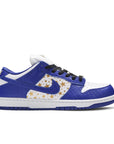Side of the Nike dunk supreme low skating shoes in a gold stars white blue hyper royal colour