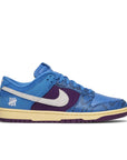 Side of the Nike dunk low undefeated 5 On It in a blue exotic colour