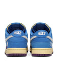 Heel of the Nike dunk low undefeated 5 On It in a blue exotic colour