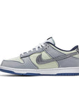 Side of the Nike Dunk Low Union Passport Pack Pistachio sneakers