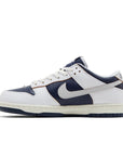 Side of Nike SB Low HUF New York in navy and white.