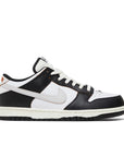 Side of Nike SB Dunk Low HUF San Francisco in black and white.