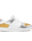 Side of the Nike SB Dunk Low Heirloom womens shoe in white and gold