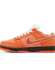 Side of Nike SB Dunk Low Concepts Orange Lobster in Orange.