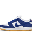 Side of the Nike sb dunk low los angeles dodgers skating shoes in white and blue