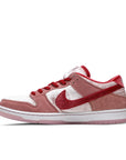 Side of the Nike sb dunk low StrangeLove Skateboard skating shoes in a pink colour