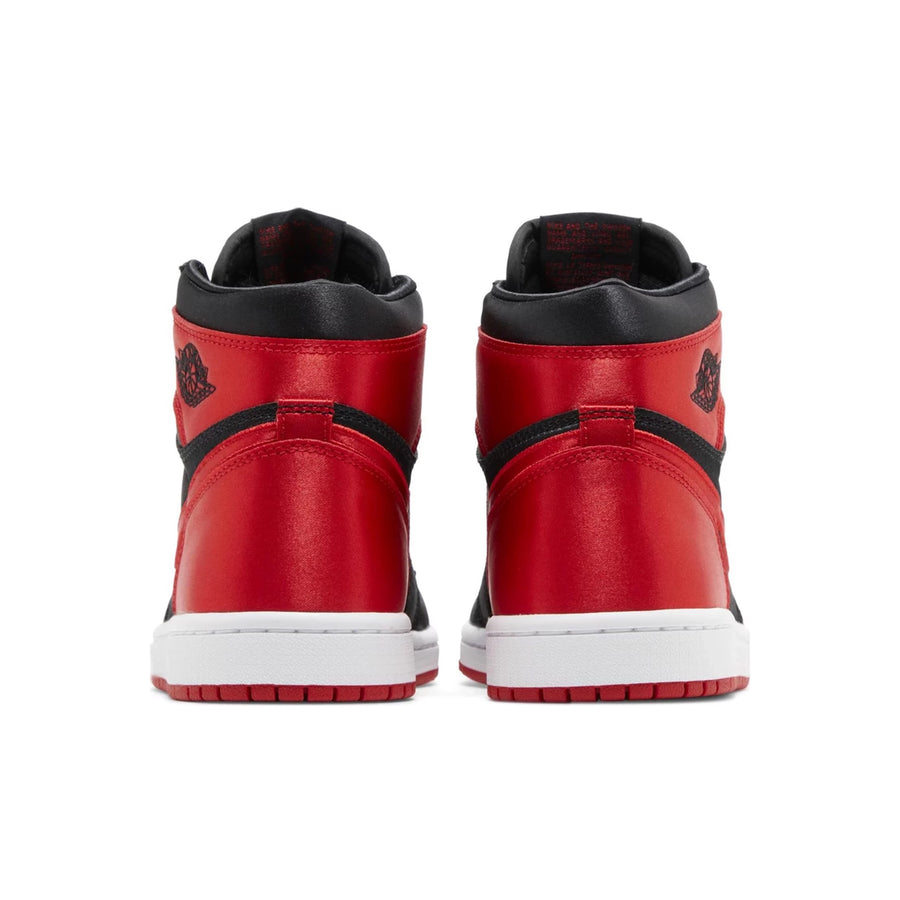 Heels of Jordan 1 Retro High OG Satin Bred (W) in black and red