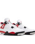 Pair of Jordan 4 Retro Red Cement in red and white.