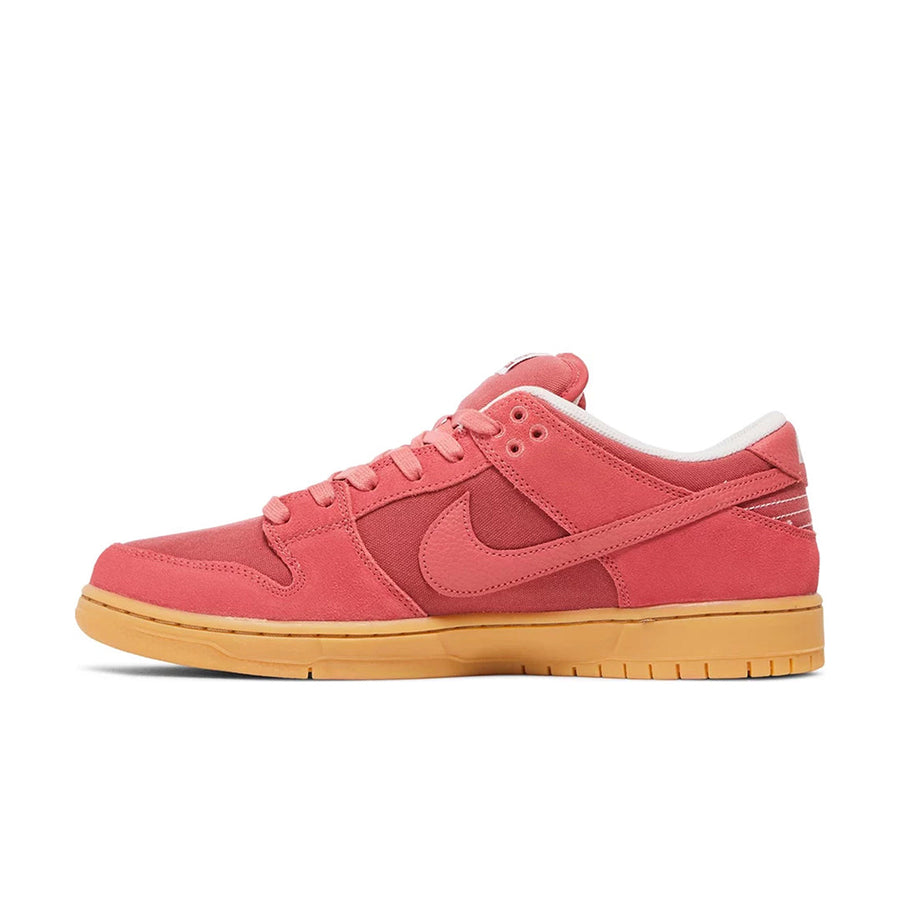 Side of Nike SB Dunk Adobe in pink and red
