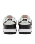 Heels of Nike Dunk Low Black Total Orange Mini Swoosh in black, white and orange.