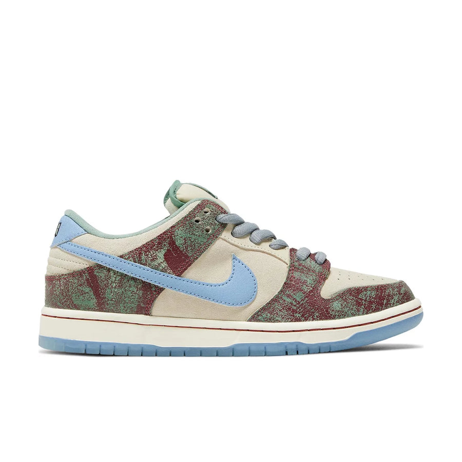 Side of Nike SB Dunk Low Crenshaw Skate Club in sail and blue.