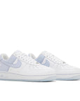 Pair of Nike Air Force 1 QS Terror Squad Loyalty in White and Porpoise Blue