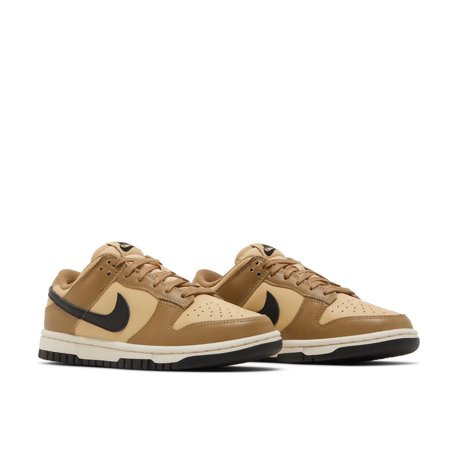 Pair of Nike Dunk Low Dark Driftwood (W) in brown and beige.