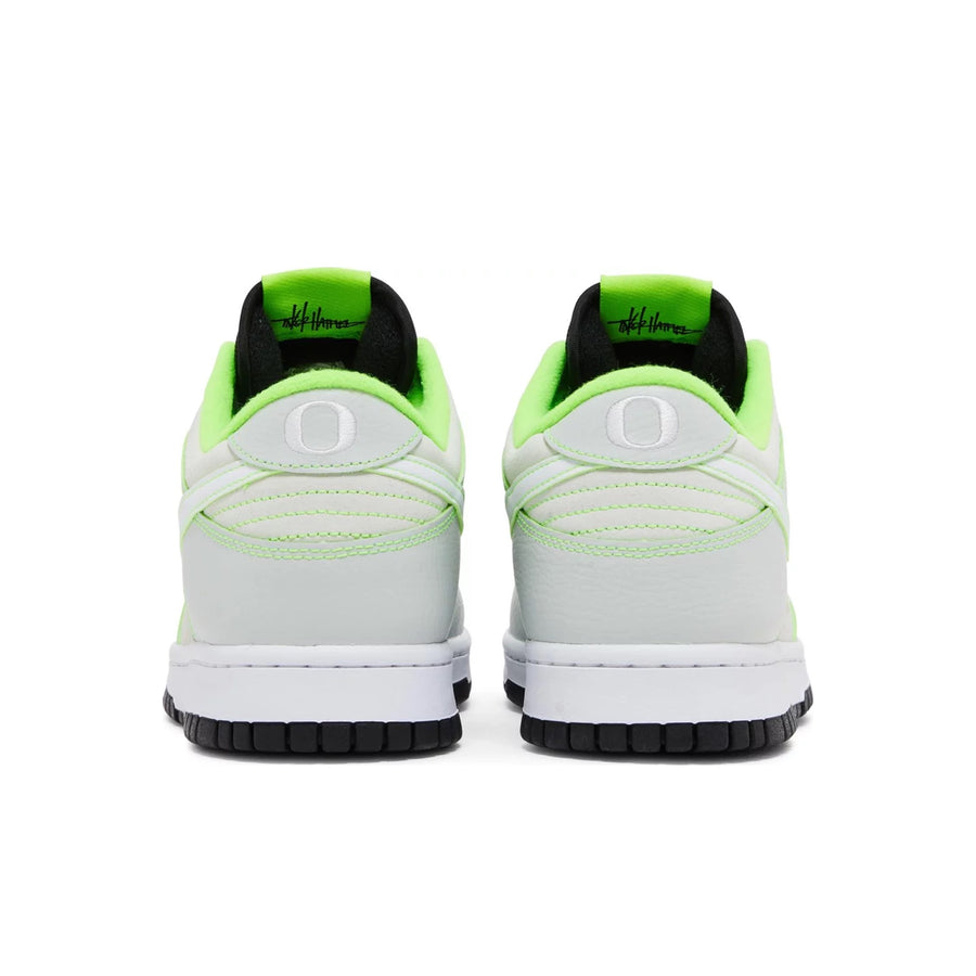 Pair of Nike Dunk low University of Oregon PE in silver, white, black and green