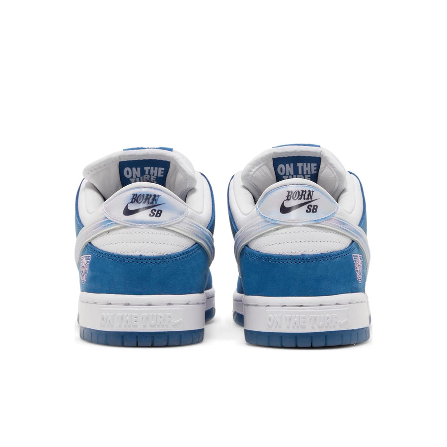 Heels of Nike SB Dunk Low Born x Raised One Block at a Time in Blue and White