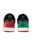 Heels of Jordan 1 Low Quai 54 (2023) in red, green, black and white.