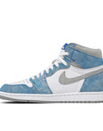 Side of the Nike Air Jordan 1 Retro High Hyper Royal Michael Jordans in white and washed out royal blue