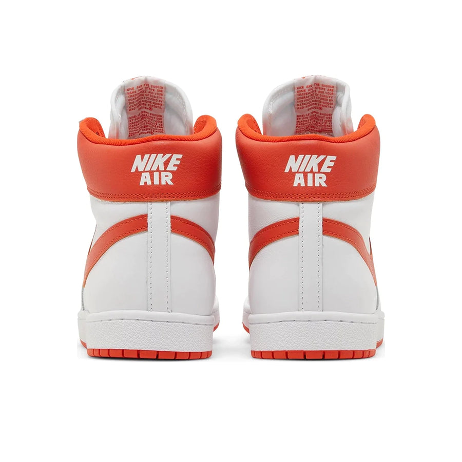 Heels of the Nike Air Ship Team Orange basketaball sneakers in white and orange