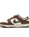 Side of Nike Dunk Low Cacao Wow (W) in white and brown
