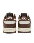 Heels of Nike Dunk Low Cacao Wow (W) in white and brown