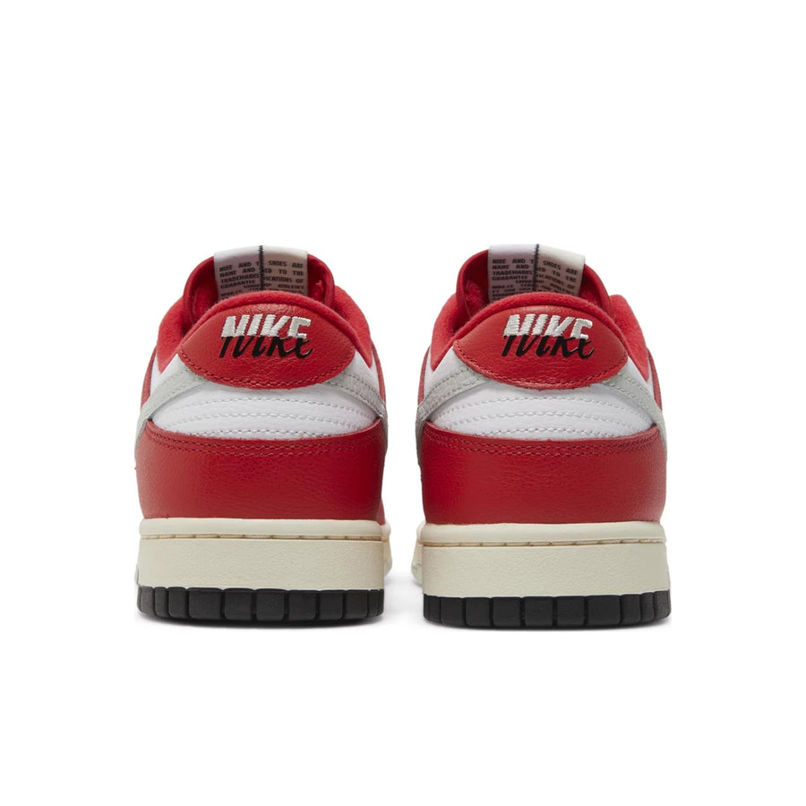 Heels of Dunk Low Chicago Split in red, black and white
