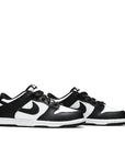 A pair of the pre-school version Nike dunk low in a black white "Panda" colour