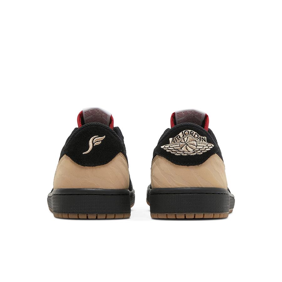 Heels of the Nike Jordan Air 1 low basketball shoes are in a black, beige and red colourway.
