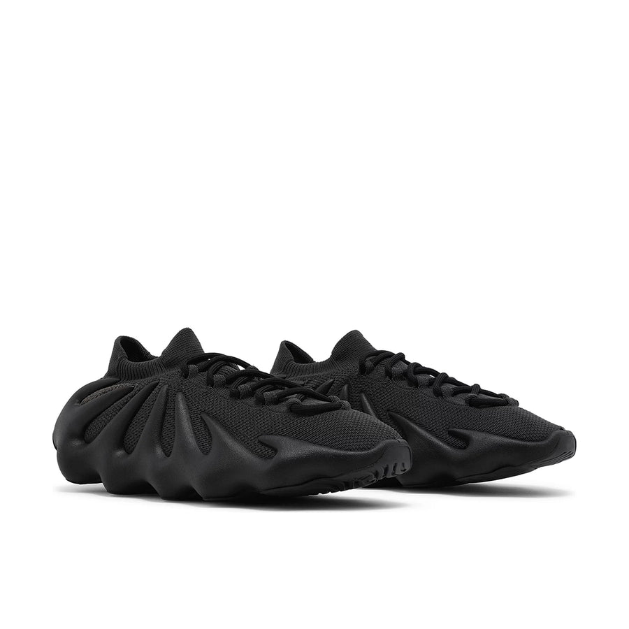 A pair of adidas Yeezy 450 Dark Slate sneakers