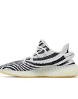 Side of the adidas Yeezy Boost 350 v2 Zebra sneaker