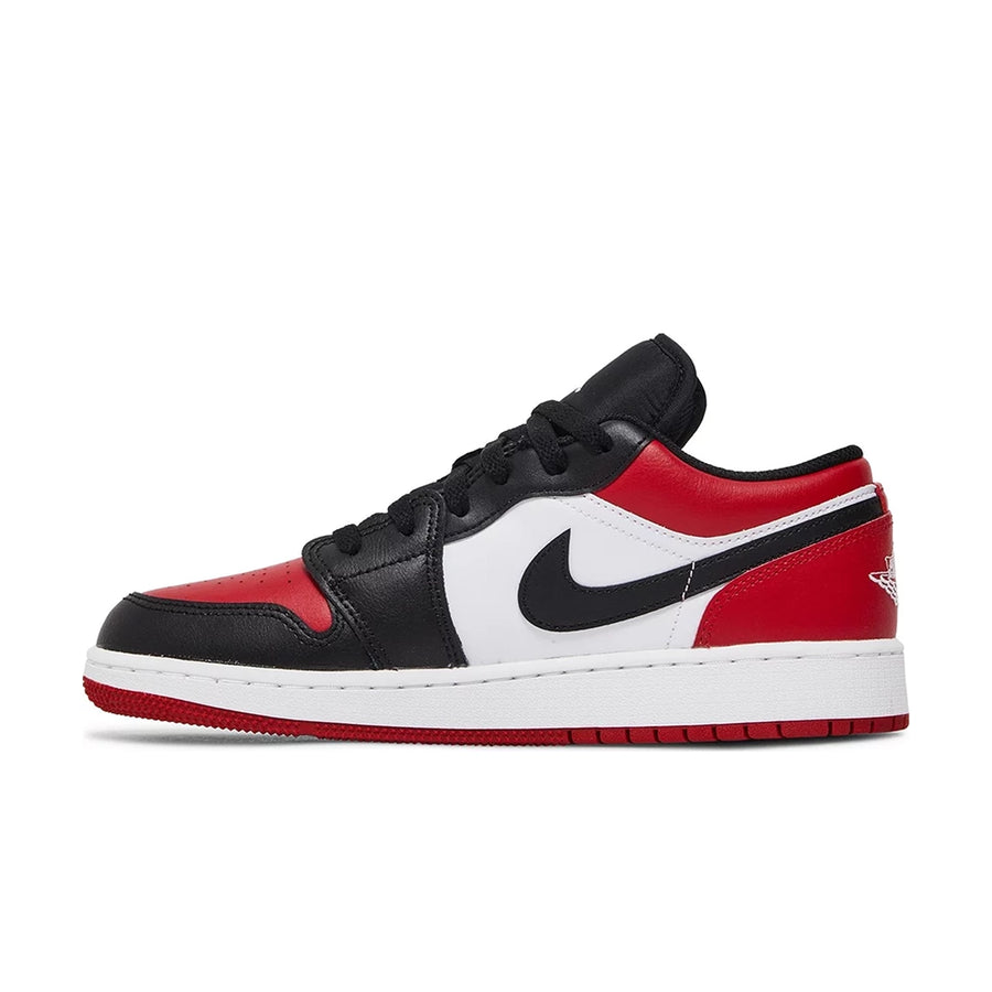 Side of Jordan 1 Low Bred Toe (GS) in red, white and black.