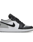 Side of Jordan 1 Shadow Toe (GS) in black, white and grey.