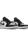 Pair of Jordan 1 Shadow Toe (GS) in black, white and grey.