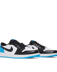 pair of Jordan 1 retro low go black dark powder blue in blue, black and white