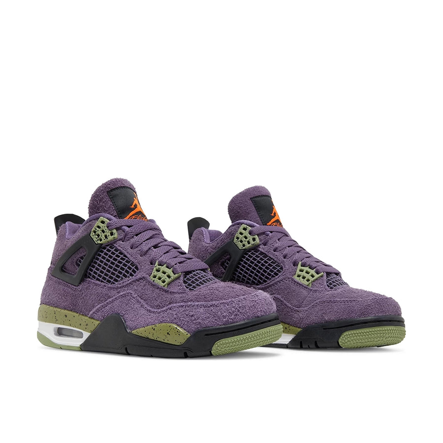 A pair of women's Nike Air Jordan 4 Retro Canyon Purple shoes in purple
