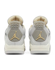 Heels of Jordan 4 Retro SE Craft Photon Dust in shades of grey.