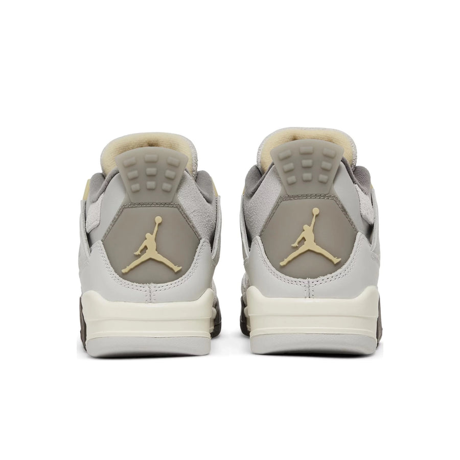 Heels of Jordan 4 Retro SE Craft Photon Dust (GS) in shades of grey