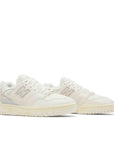 A pair of New Balance 550 Aime Leon Dore White Leather sneakers