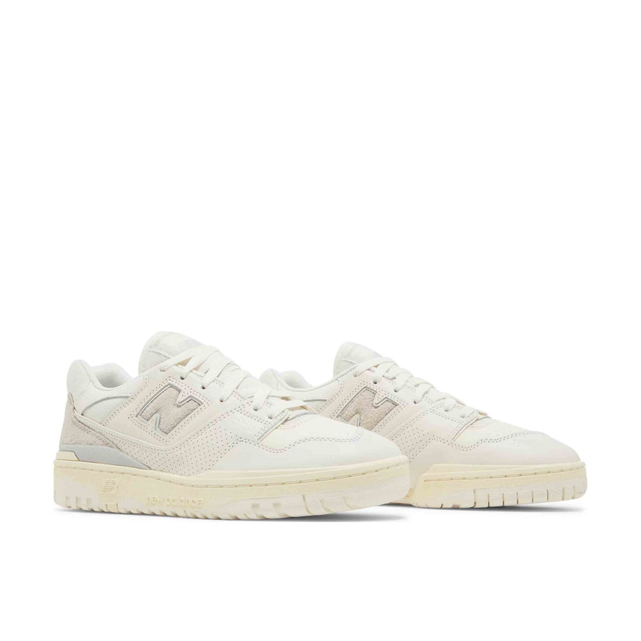 A pair of New Balance 550 Aime Leon Dore White Leather sneakers