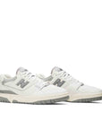 A pair of New Balance 550 Aime Leon Dore White Grey sneakers